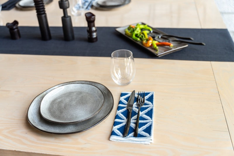 modern plate setting with African printed napkins