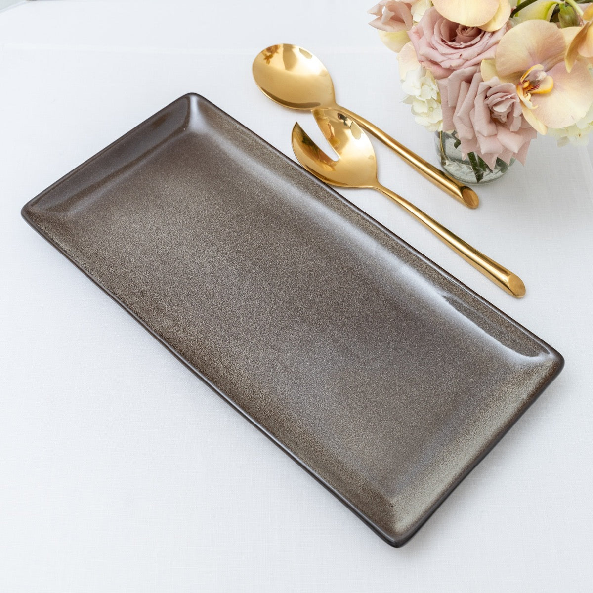 Fork and Spoon Serving Set shinny Gold showing their radiant and luxurious finish.