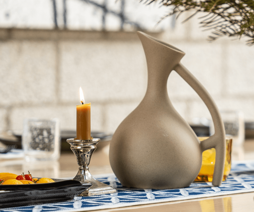 Onna Ehrlich Sleek ceramic pitcher with a smooth finish, perfect for adding a touch of elegance to any table setting 