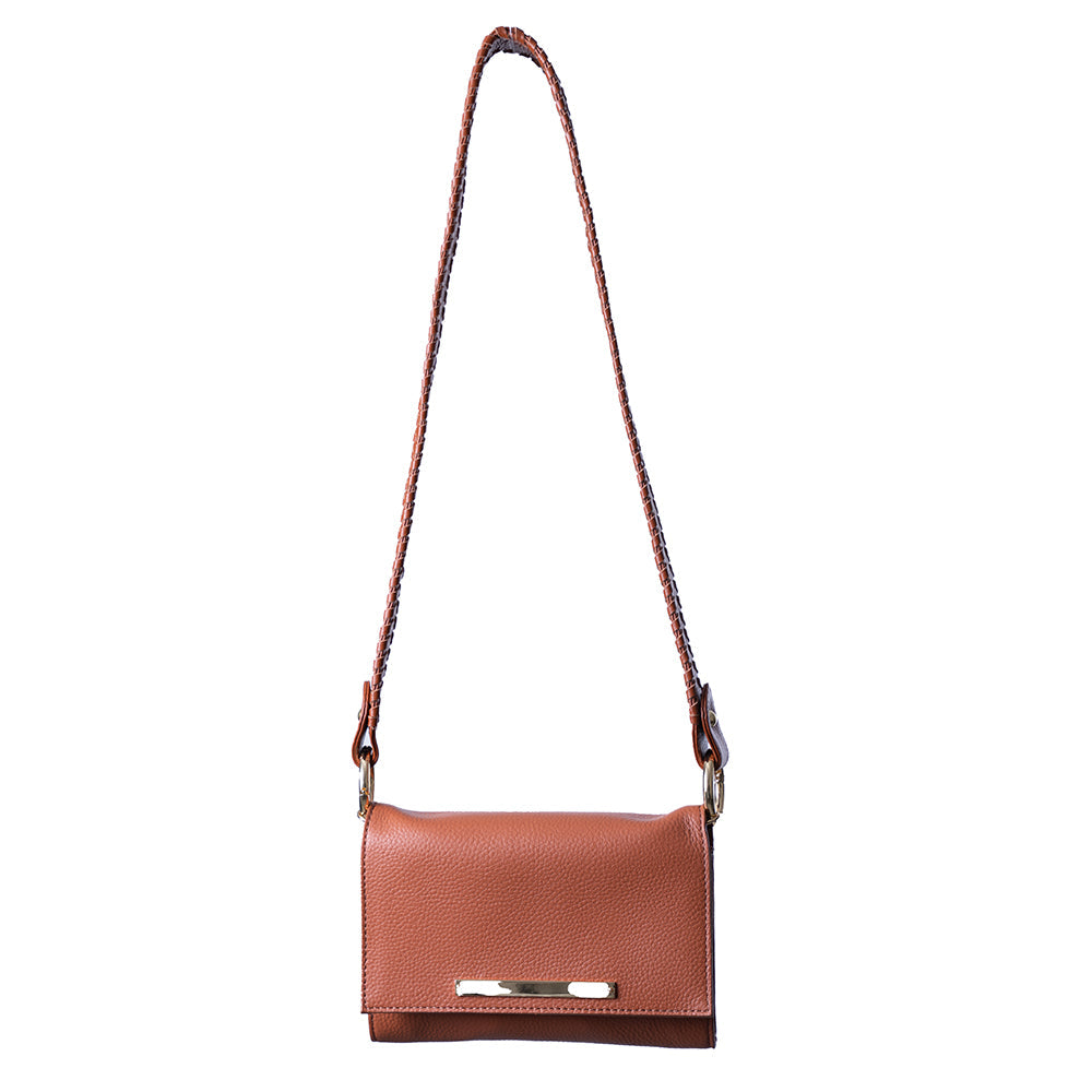 Lelu crossbody bag in rich cognac hue, displayed to emphasize its sleek design and stylish versatility for on-the-go fashion