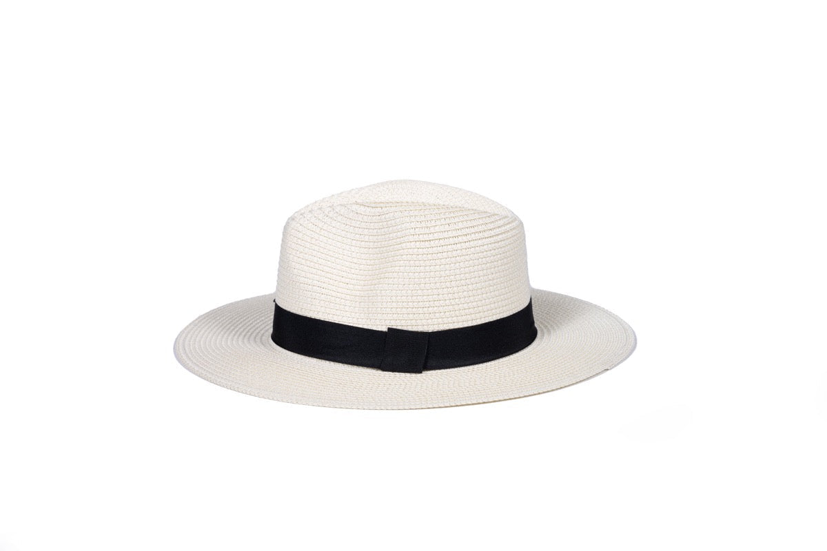 Onna Ehrlich Foldable cream colored hat, laid out to showcase, perfect for stylish sun protection on the go and foldable for traveling 