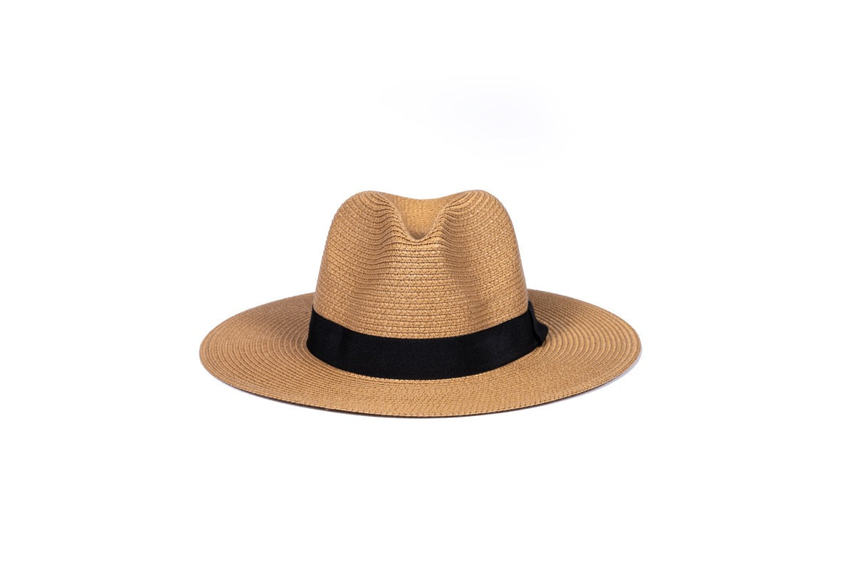 Onna Ehrlich Foldable natural colored hat, laid out to showcase, perfect for stylish sun protection on the go and foldable for traveling 